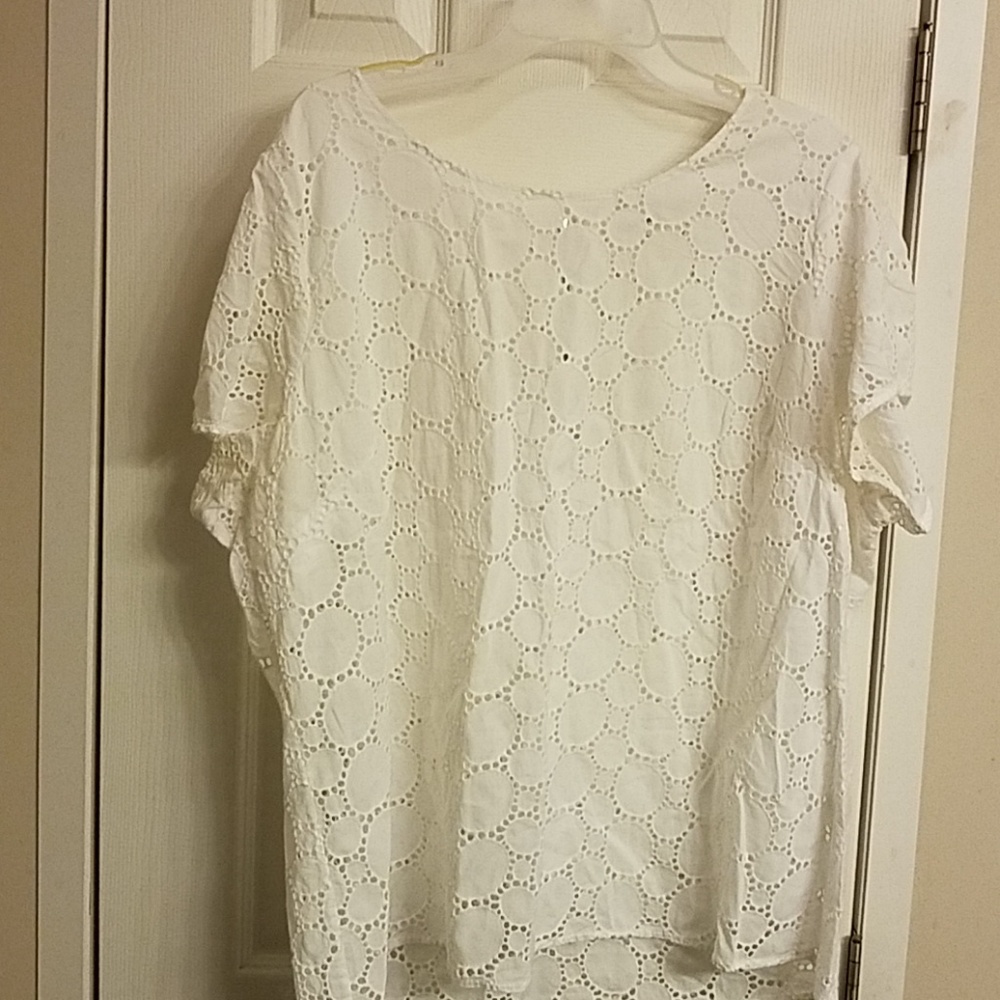 Short sleeve eyelet top.